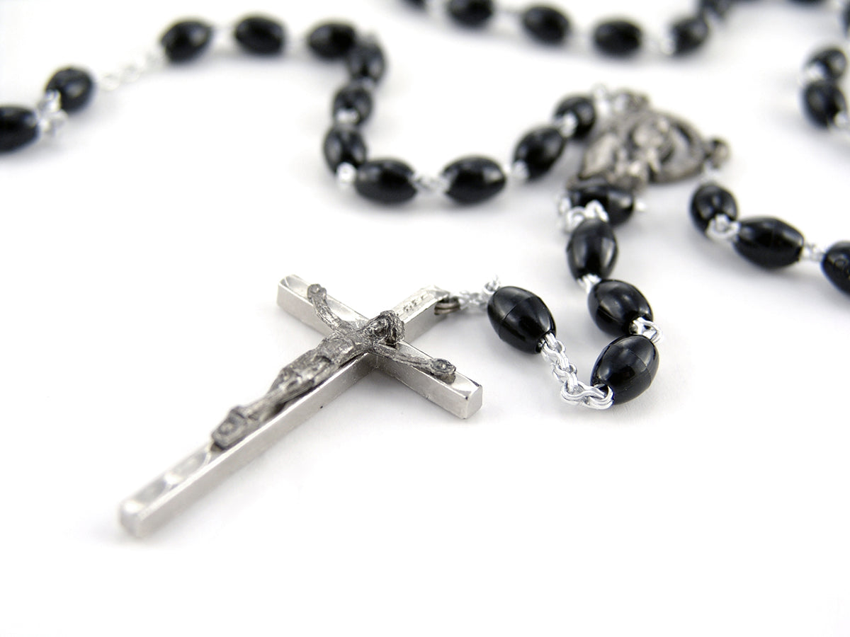 Free Rosary with Black Beads and Cross Stock Photography