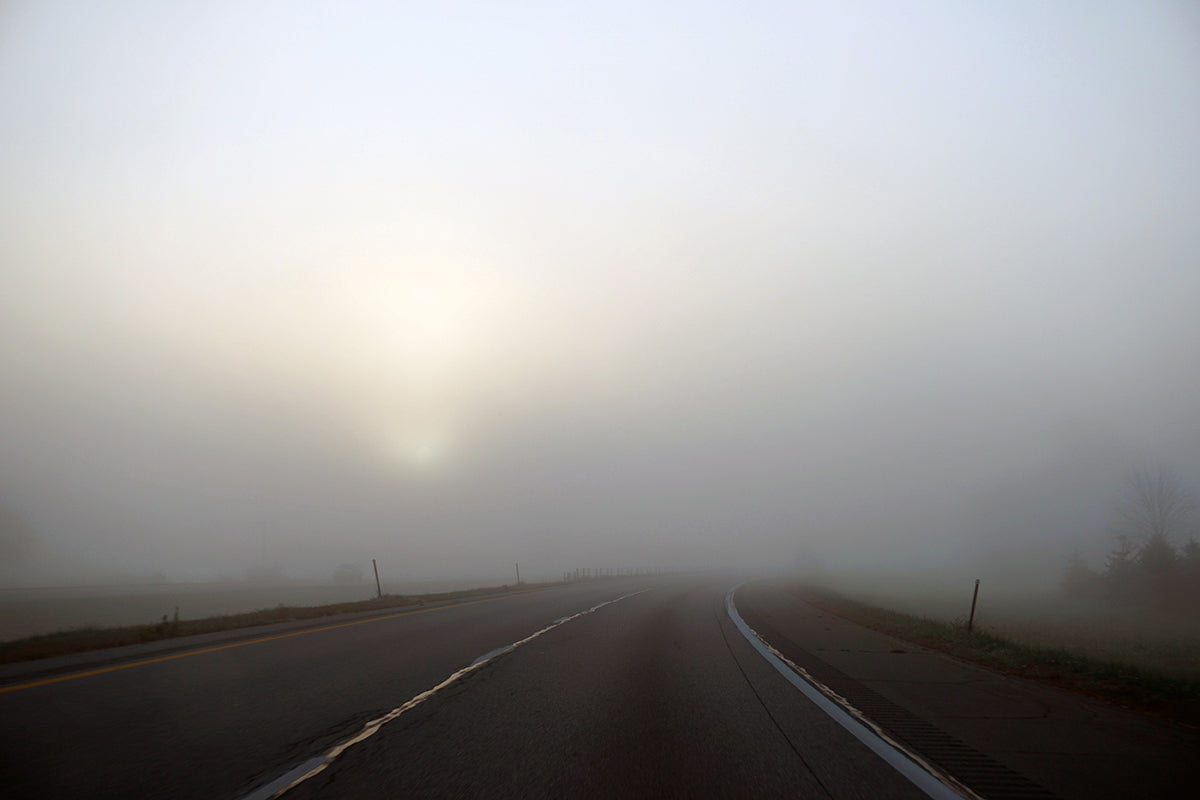 Free Empty Highway in Dense Fog Stock Photography
