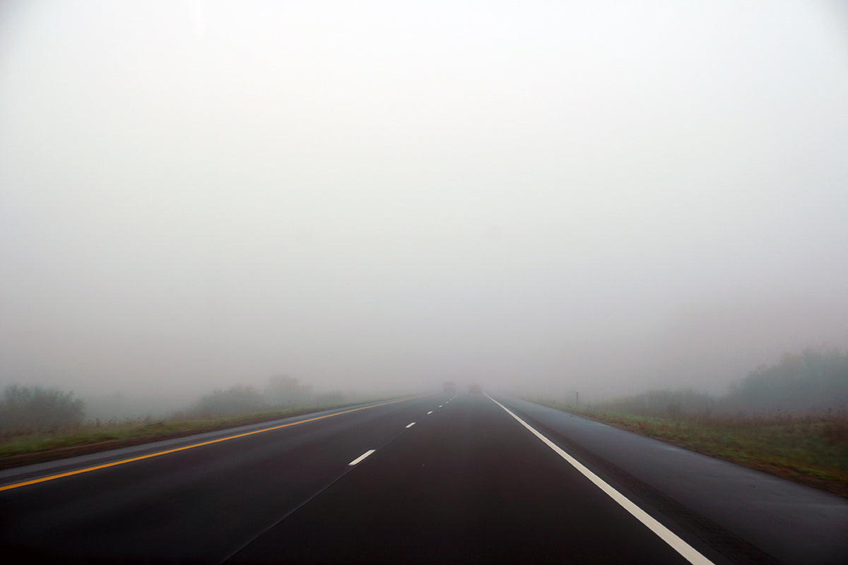 Free Straight Road Through Thick Fog Stock Photography