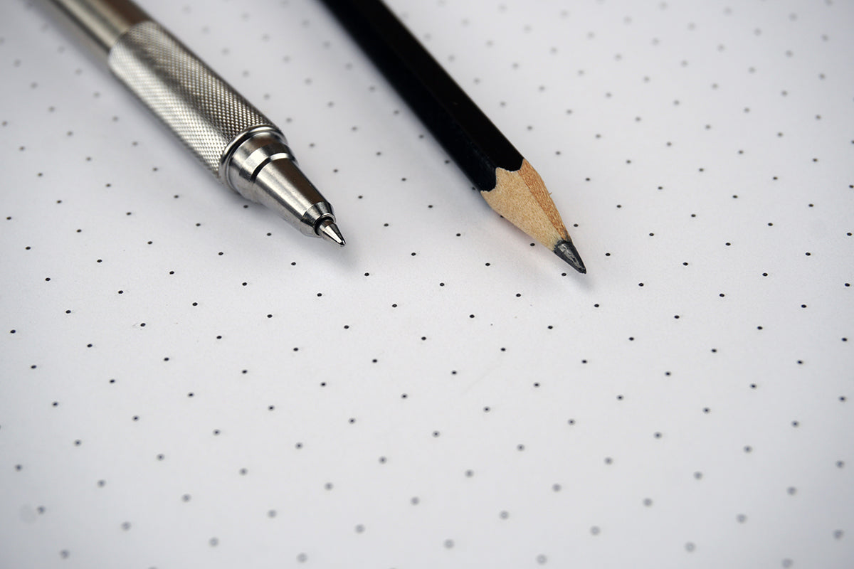 Free Pen and Pencil on Dot Grid Stock Photography
