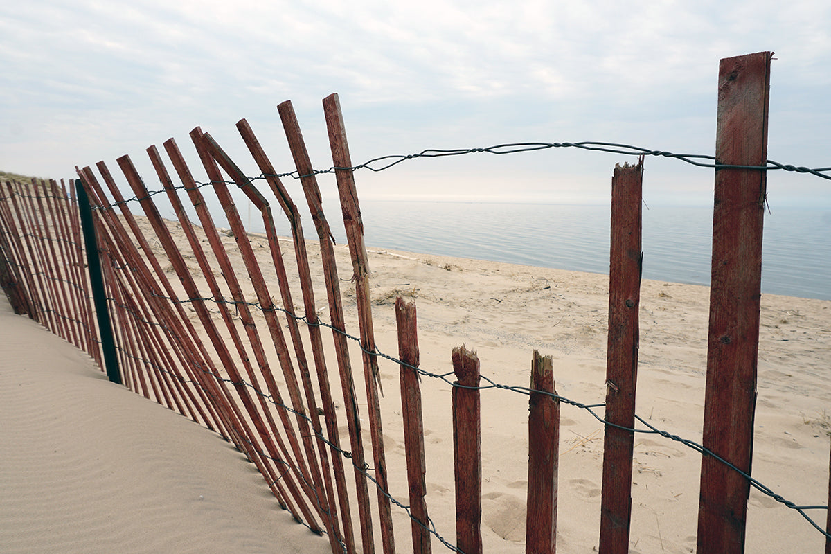 Free Weathered Sand Fence by Lake Stock Photography