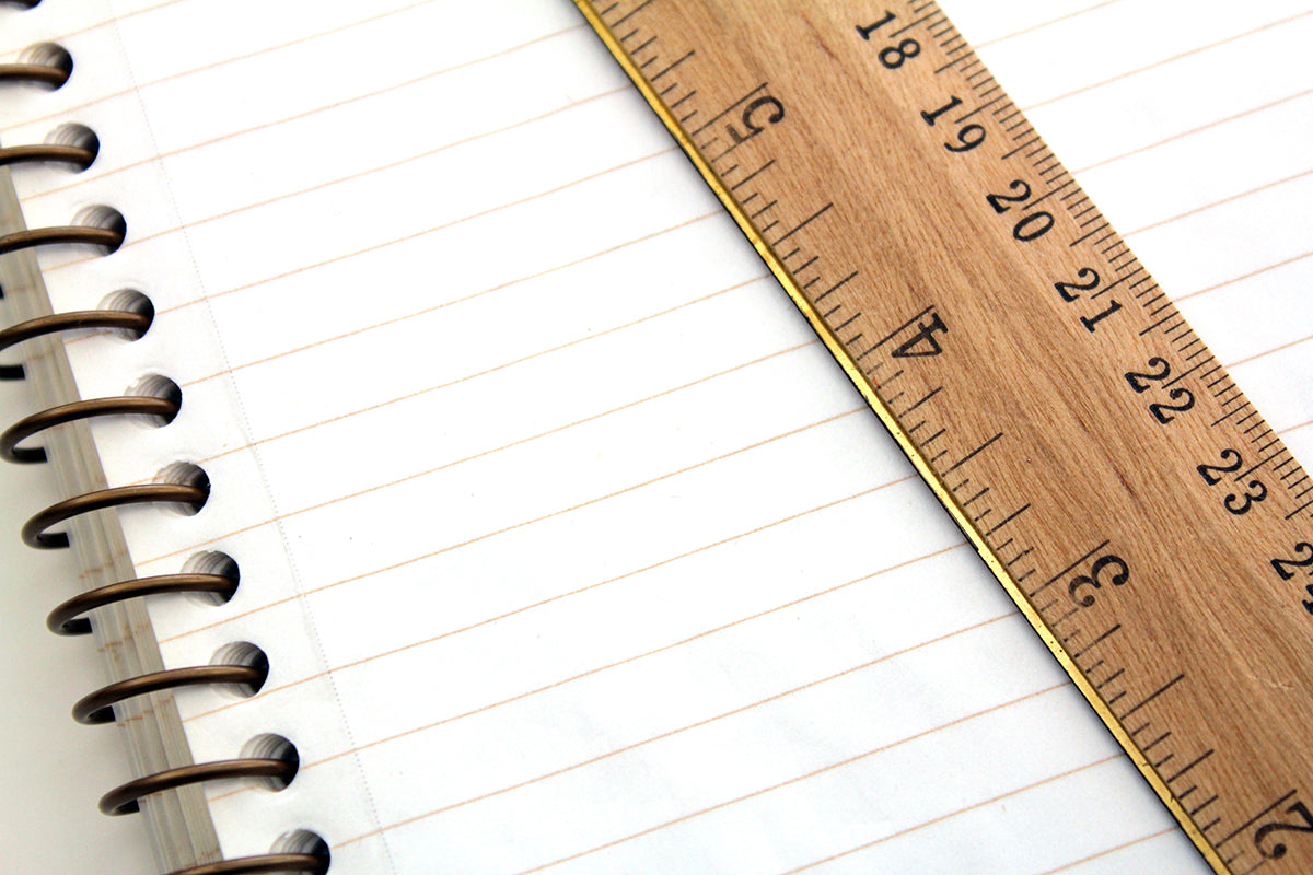 Free Notebook and Wooden Ruler Stock Photography