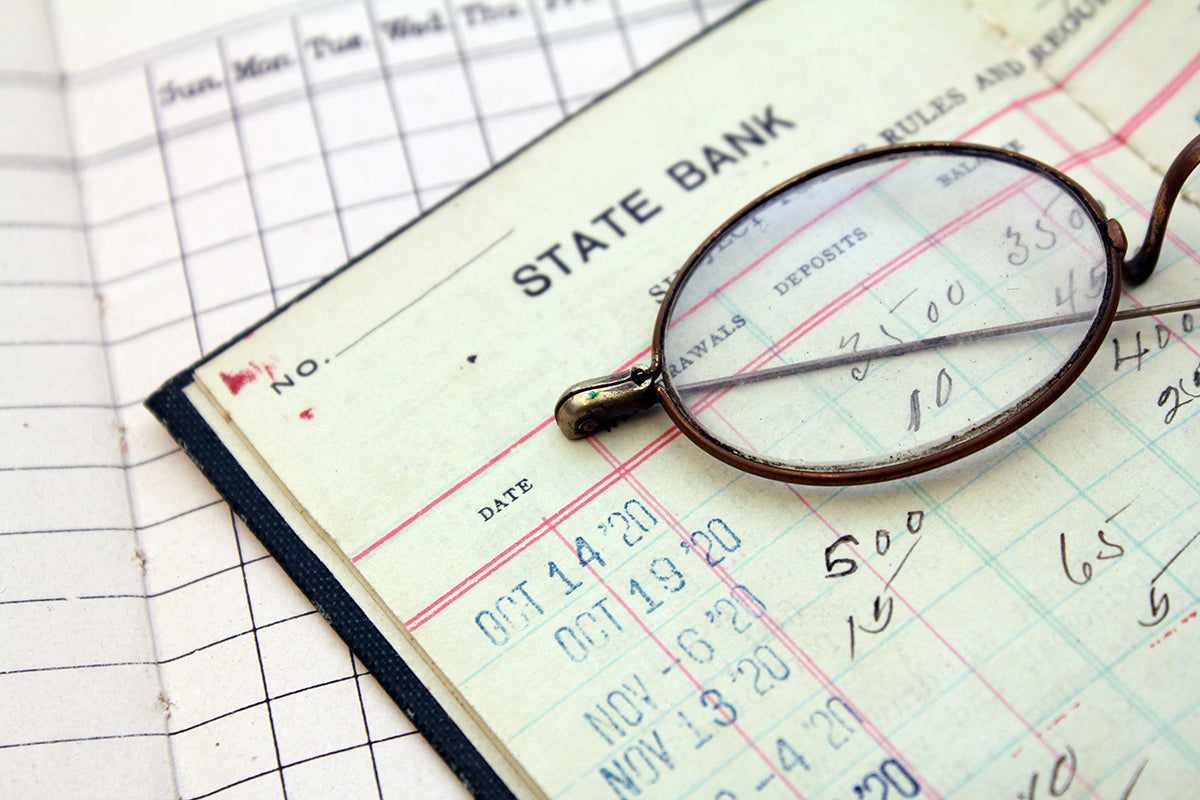Free Vintage Bank Ledger and Glasses Stock Photography