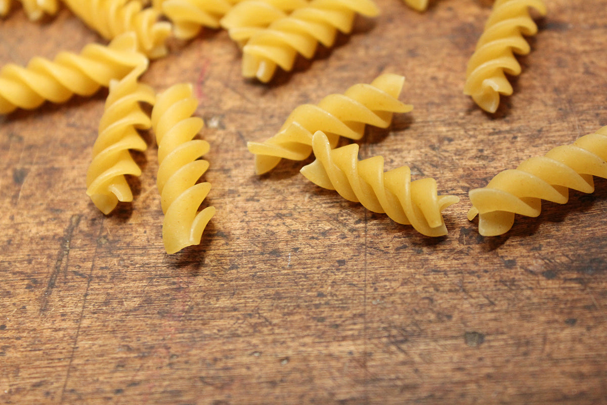 Free Rotini Pasta on Wooden Surface Stock Photography