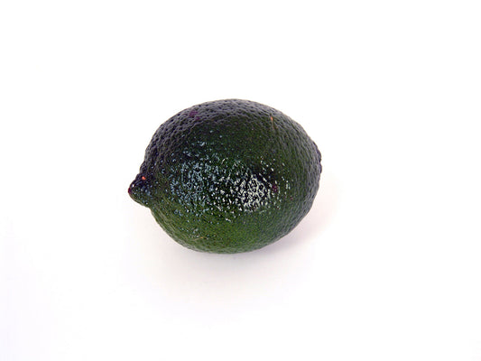 Free Single Lime on White Stock Photography