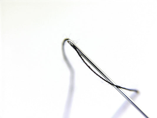 Free Threaded Needle Close-Up Stock Photography