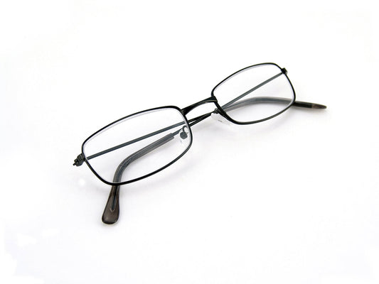 Free Eyeglasses with Black Frames on White Stock Photography