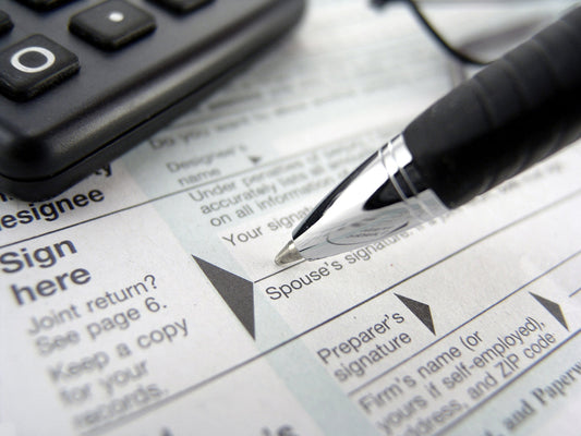 Free Signing Tax Documents Stock Photography