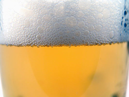 Free Beer Close-Up with Foam Stock Photography