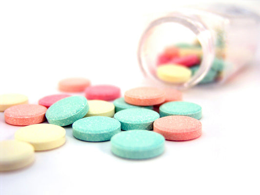 Free Antacid Tablets in Soft Pastel Colors Stock Photography