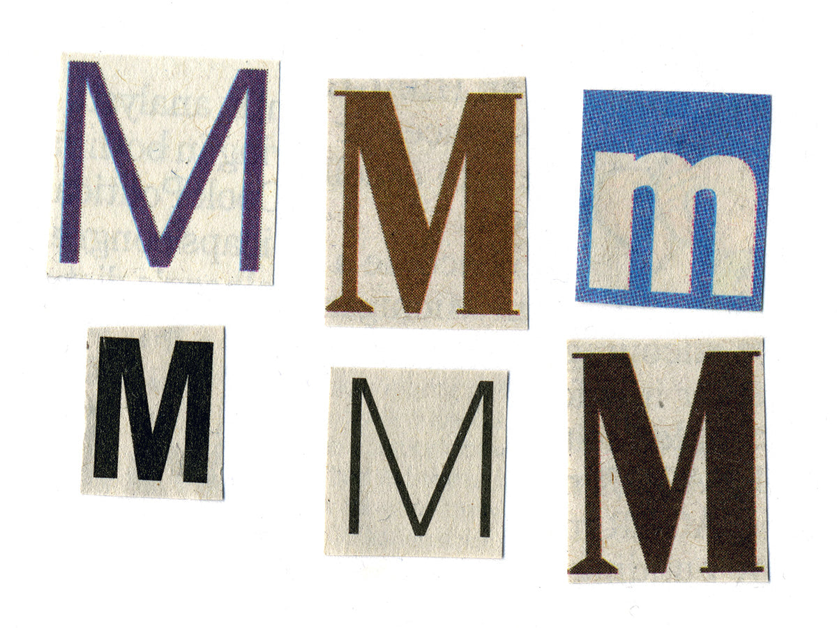 Free Cutout M Letters from Magazines Stock Photography