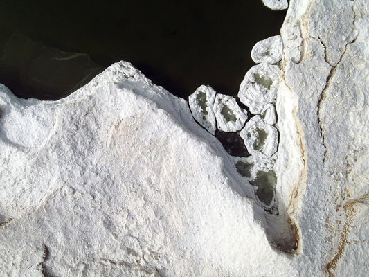 Free Close-Up of Ice Caves Along Shore Stock Photography