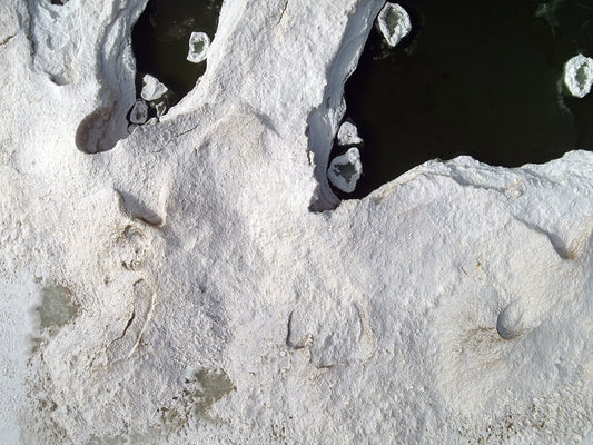 Free Frozen Shore with Jagged Ice Pools Stock Photography