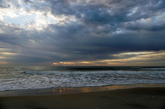 Free Evening Light Over Ocean Shoreline Stock Photography