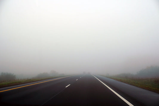 Free Straight Road Through Thick Fog Stock Photography