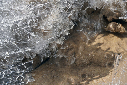 Free Melting Ice Over Sand Stock Photography