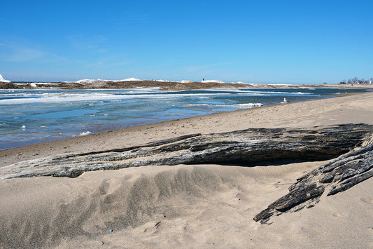 Free Frozen Beach with Lighthouse Stock Photography
