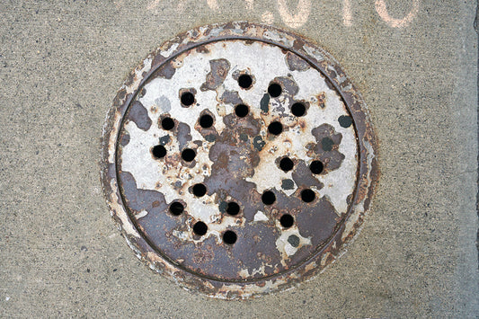 Free Rusty Storm Drain Cover Stock Photography