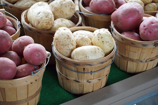 Free Baskets of Fresh Potatoes Stock Photography