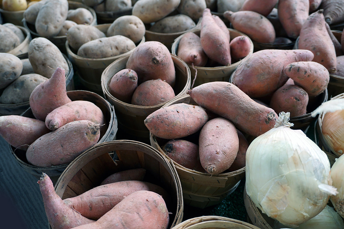Free Sweet Potatoes in Wooden Baskets Stock Photography