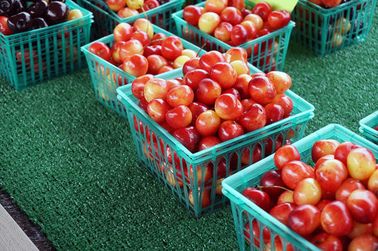 Free Fresh Cherries in Green Baskets Stock Photography