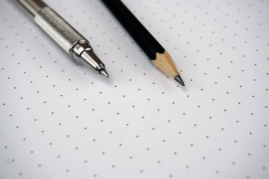 Free Pen and Pencil on Dot Grid Stock Photography