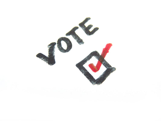 Free Vote Text with Red Checkmark Stock Photography