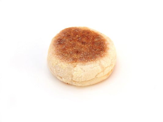 Free Whole English Muffin on White Stock Photography
