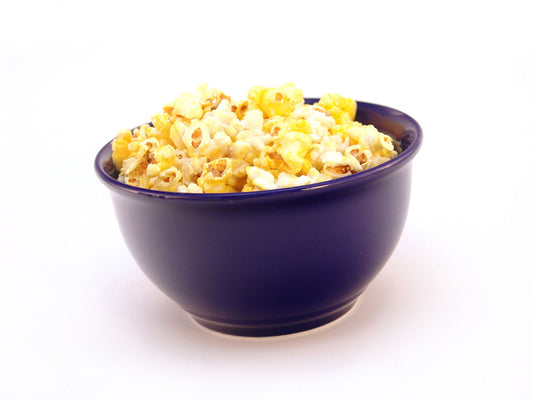 Free Bowl of Buttered Popcorn Stock Photography