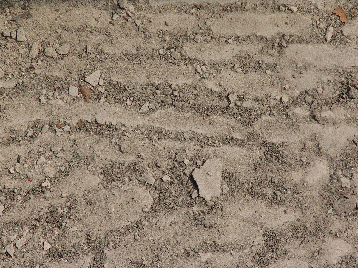 Free Rough Dirt Texture with Pebbles Stock Photography