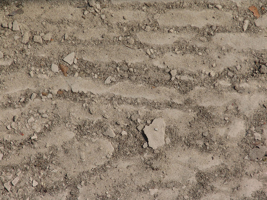 Free Rough Dirt Texture with Pebbles Stock Photography