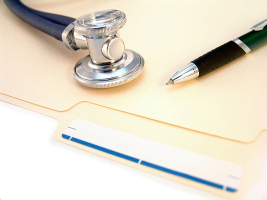 Free Medical Tools on Folder Background Stock Photography