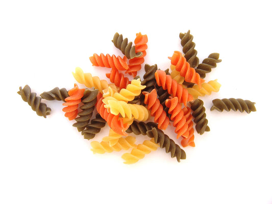 Free Tricolor Rotini Pasta on White Background Stock Photography