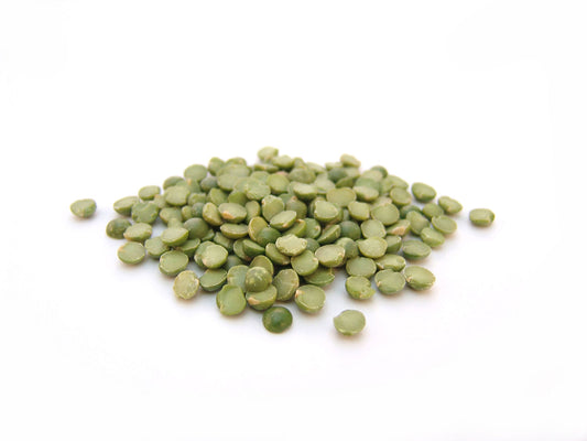 Free Green Split Peas on White Background Stock Photography
