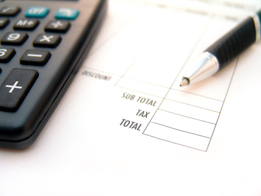 Free Subtotal and Tax on Invoice with Calculator Stock Photography