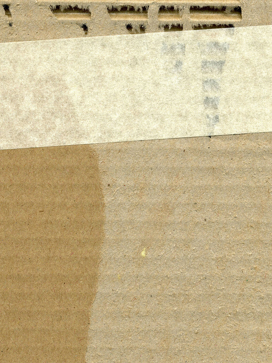 Free Torn Tape on Cardboard Stock Photography
