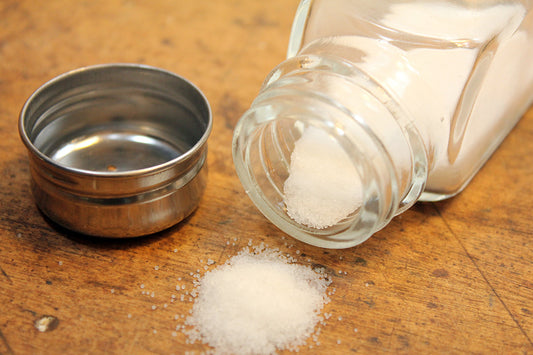 Free Spilled Salt from Glass Shaker Stock Photography